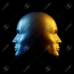 12426655-Two-faced-head-statue-with-one-face-gold-the-other-blue--Stock-Photo
